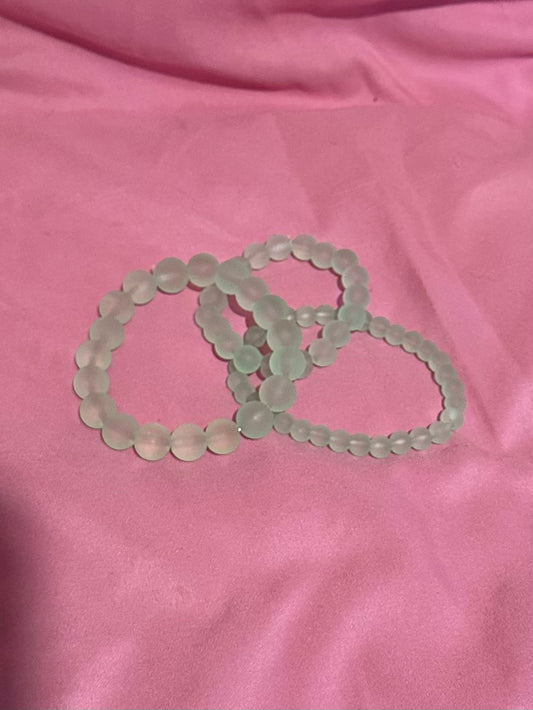 Green bracelet stack